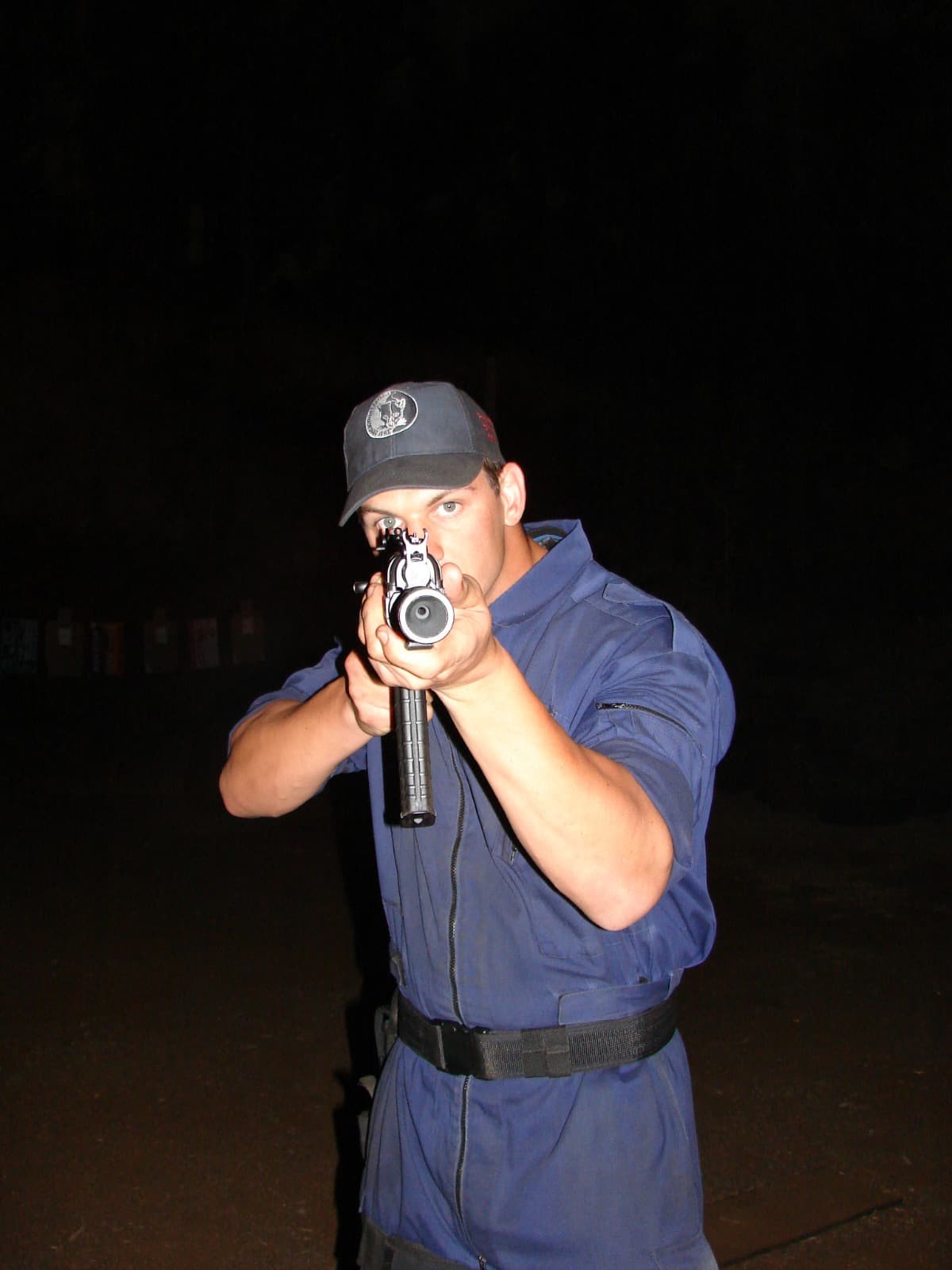 Global Security Professionals night rifle aiming portrait image 5